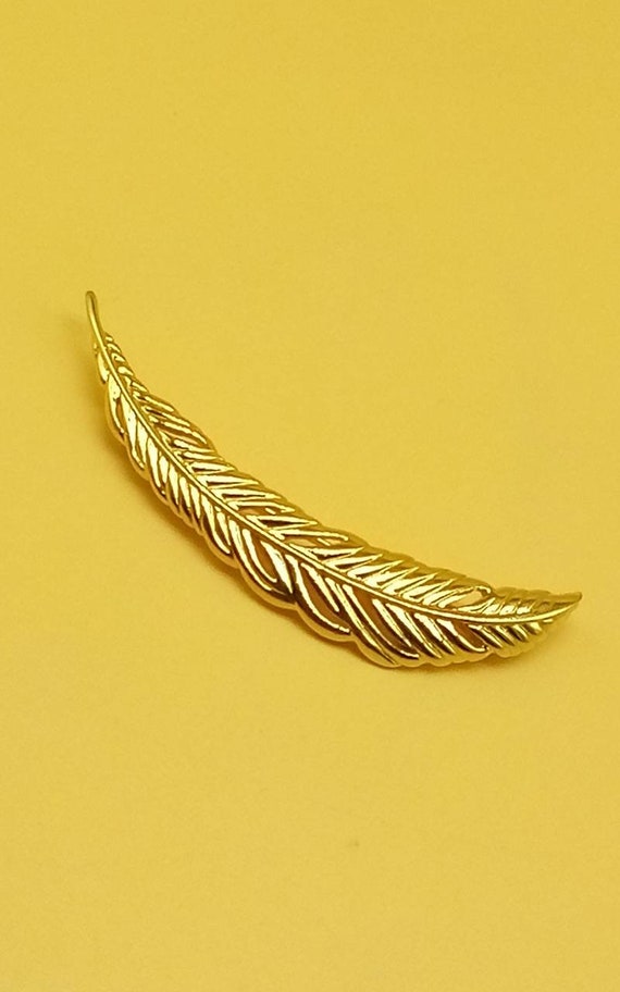 Vintage large Monet gold tone feather brooch