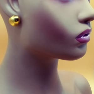 Monet gold tone bean nugget pierced earrings
