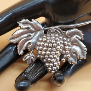 Vintage Lang sterling grape cluster brooch