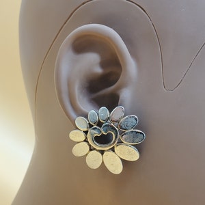 Vintage Monet gold tone flower shaped clip on earrings