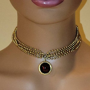 Vintage AK gold tone 5 strand metal bead ball choker necklace with red domed center