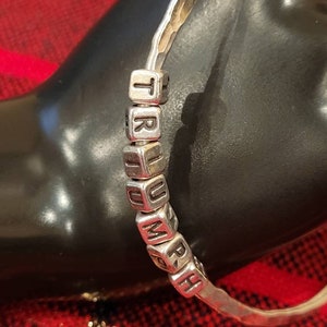 Vintage sterling letter block TRIUMPH hammered bangle bracelet