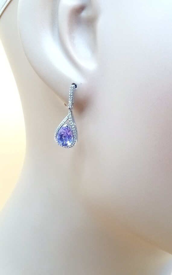 Dangling Sterling purple crystal earrings