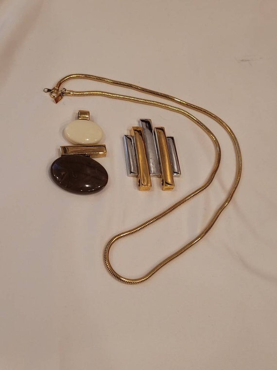 Vintage Avon gold tone snake chain with 2 pendants