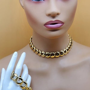 Vintage Monet gold tone link necklace with matching bracelet