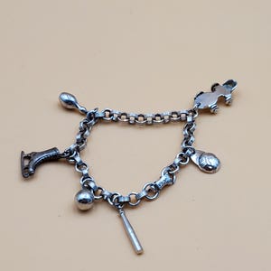 Vintage Coro silver tone kids sports charm bracelet