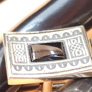 vintage Damascene top cufflinks with dark center stone