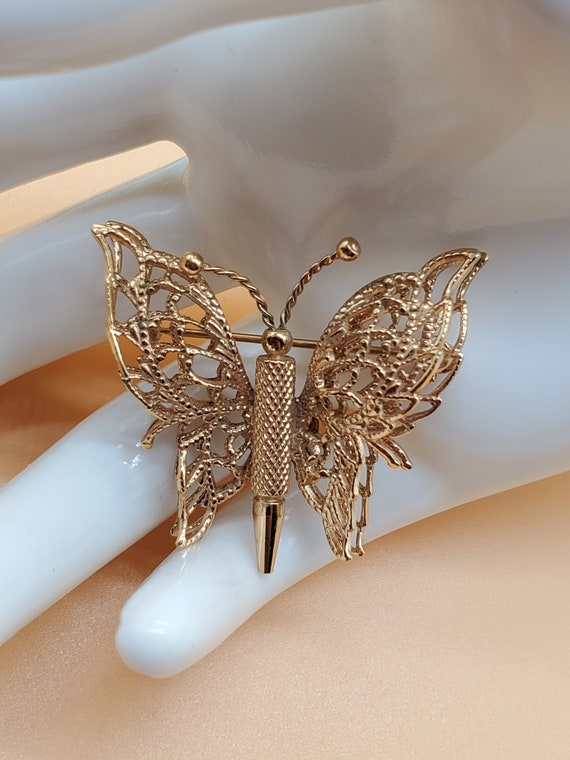 vintage Monet gold tone filigree butterfly brooch