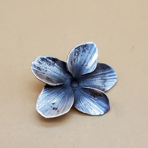 Vintage sterling dogwood flower pin