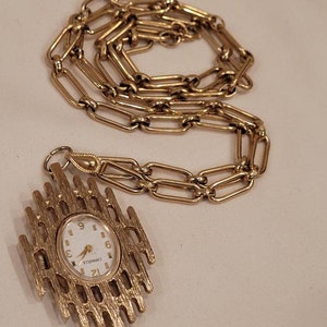 Vintage Caravelle Japan wind up watch pendant necklace