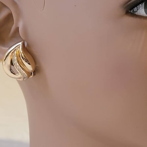 Vintage Christian Dior gold tone clear stones clip on earrings