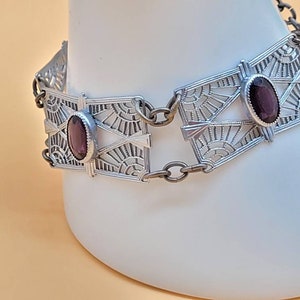 Vintage silver tone rhodium plated Art Deco style panel link bracelet with purple glass stones