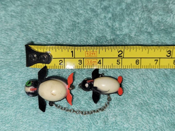 Celluloid penguin pin Vintage Celluloid chained penguins