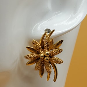 Vintage Judith McCann style gold tone floral wing back earrings