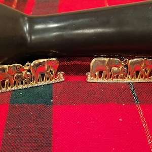 Vintage gold tone elephant family brooch with rhinestone accents, select styles