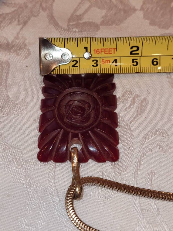 Vintage red carved Bakelite flower pendant - image 7