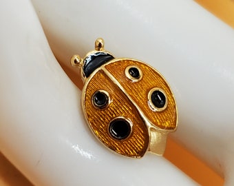 Vintage Avon yellow and black enamel ladybug pin