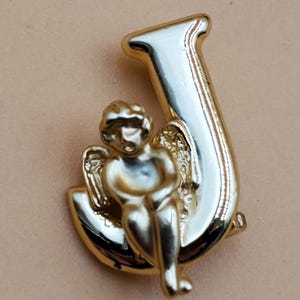 vintage L Raza gold tone letter J with sitting angel brooch