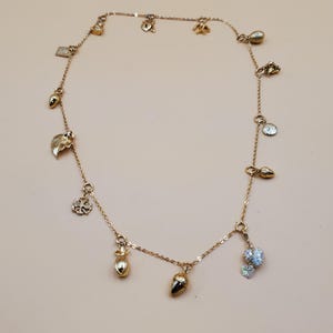 vintage Joan Rivers gold toned chained charms link necklace