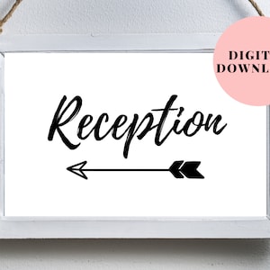 May include: White framed sign with black text that reads "Reception" with a black arrow pointing to the right. The sign is hanging from a string.