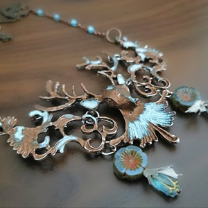 Vintage bib necklace, aged bronze and verdigris deer head, blue beads