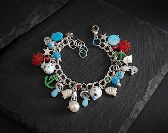 Charm-Armband: Meeresgrund, Meerjungfrau, Anker, Tiefseefisch