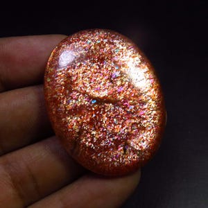 Pietra del sole africana naturale al 100%, 38 x 29 mm, pietra preziosa di pietra del sole scintillante arcobaleno AAA+, 63 carati, cabochon ovale traslucido di pietra del sole, pietra preziosa curativa,