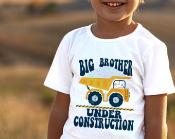 Camiseta "Ascenso a Gran Hermano": Anuncio de embarazo en camión de construcción