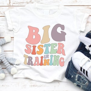 Big Sister In Training T-Shirt for baby, toddler or youth -  Big Sister baby Announcement Idea - Pregnancy Reveal Announcement