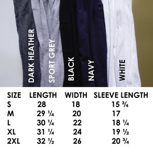May include: Size chart for a long-sleeve t-shirt in five colors: dark heather, sport grey, black, navy, and white. The chart shows the length, width, and sleeve length in inches for sizes S, M, L, XL, and 2XL.