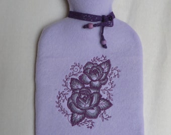 Couverture câline brodée avec la bouteille de chaleur rose motif cadeau rose rose