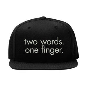 May include: Black baseball cap with white text that reads "two words. one finger."