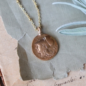 Bronze pendant with Athena wearing a helmet, reproduction of an ancient tetradrachm, archaeological jewel, ancient jewel, ancient Greece