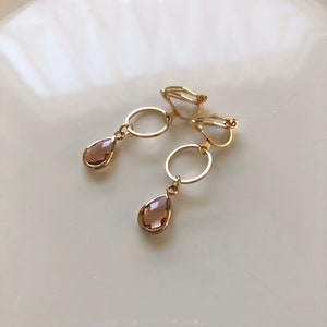 delicate ear clips in light gold pink