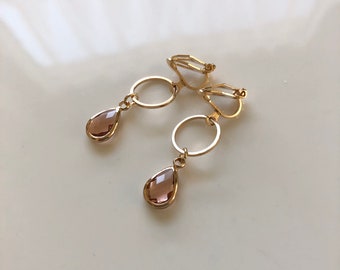 delicate ear clips in light gold pink