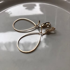 Drop ear clips in light gold