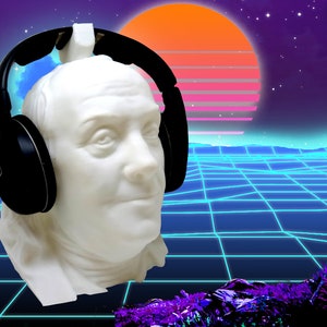 May include: A white bust of a person wearing black over-ear headphones against a blue and purple grid background with a sunset in the background.