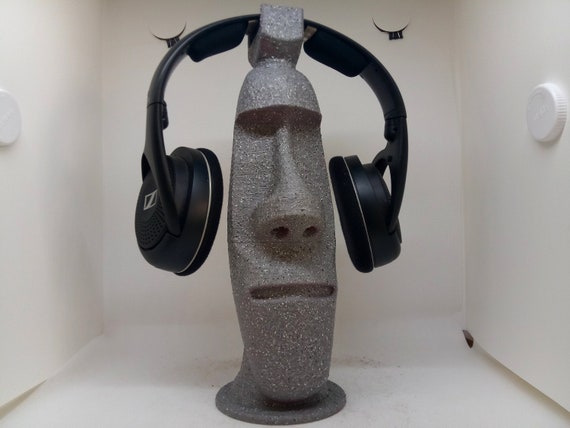 Catchy rap album cover featuring easter island statue with sunglasses