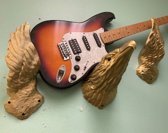 Gold Eagle Guitar Wall Hanger - Customizable Color - Rock 'N' Roll Style - Unique Music Decor - Striking 3-Piece Metallic Design
