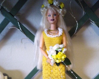Barbie in her yellow gown.