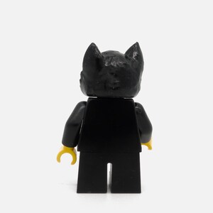 black cat with figure from LEGO image 3