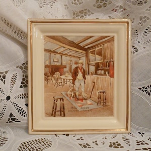 May include: A framed illustration of a man in a pub with a dog. The illustration is titled "Bill Sikes (Oliver Twist)".