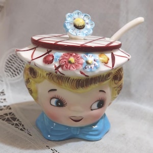 Collectible Vintage Lefton Miss Dainty Jam Jelly Jar Pot w/ Spoon Big Innocent Eyes Blue Bow White & Reg Checked Hat Flowers Finial Blonde