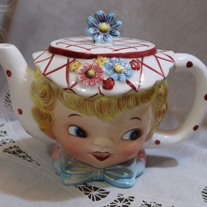 Darling Vintage Lefton Miss Dainty Teapot Tea Pot Big Innocent Eyes Blue Bow White & Reg Checked Hat Flowers Finial Blonde Pink Blouse