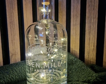 Botella de ginebra con luces