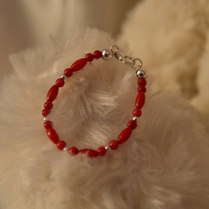 Chinese coral bracelet for best sale baby meaning