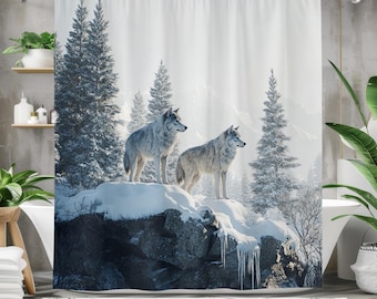 May include: Two white wolves stand on a snowy rock formation in a wintery forest. The wolves are facing different directions, and the trees are covered in snow. The background is a snowy landscape with a blue sky.