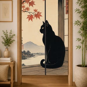 May include: A split door curtain featuring a black cat sitting on a wooden porch overlooking a landscape with mountains, a lake, and red maple leaves. The design includes vertical Japanese text on the right side and a red seal on the left side.