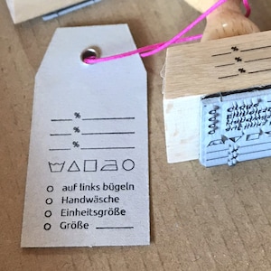 sonderpreis -KLEINER (!!) stempel pflegehinweis wäschepflege pflegeetikett für KLEINERE etiketten + anhänger. bitte beachte die größe :-) !!