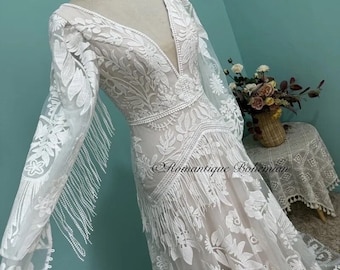 More Dresses @RomantiqueBoho.com Unique Lace Boho Wedding Dress Chic Deep V Open Back Tassel Puff Sleeve Vintage Bridal Gowns